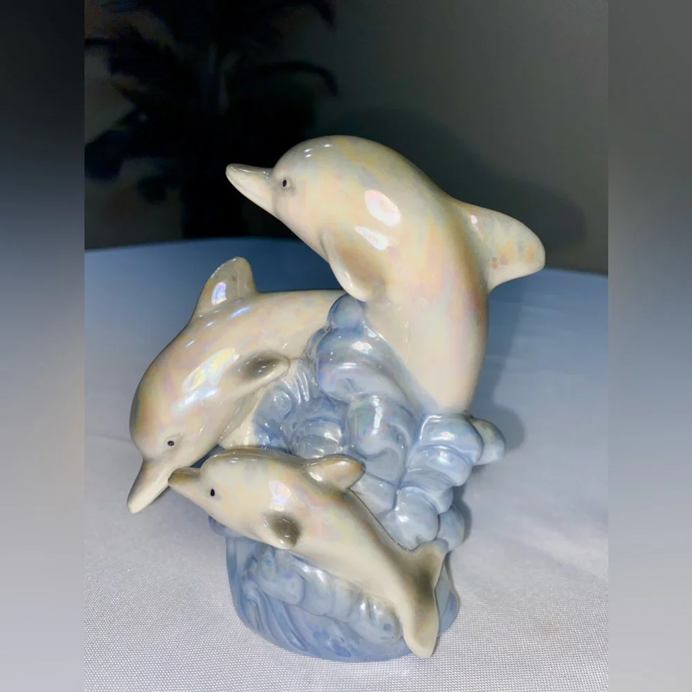 Glazed Ceramic Dolphin Trio on a blue Wave